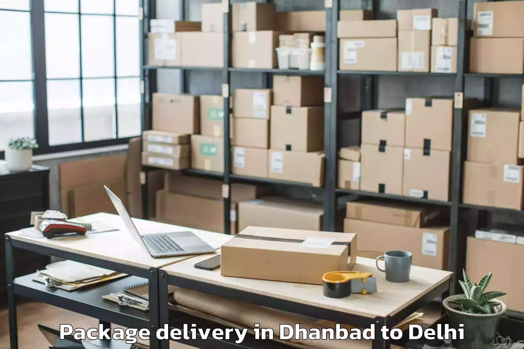 Dhanbad to Parsvnath Mall Inderlok Package Delivery Booking